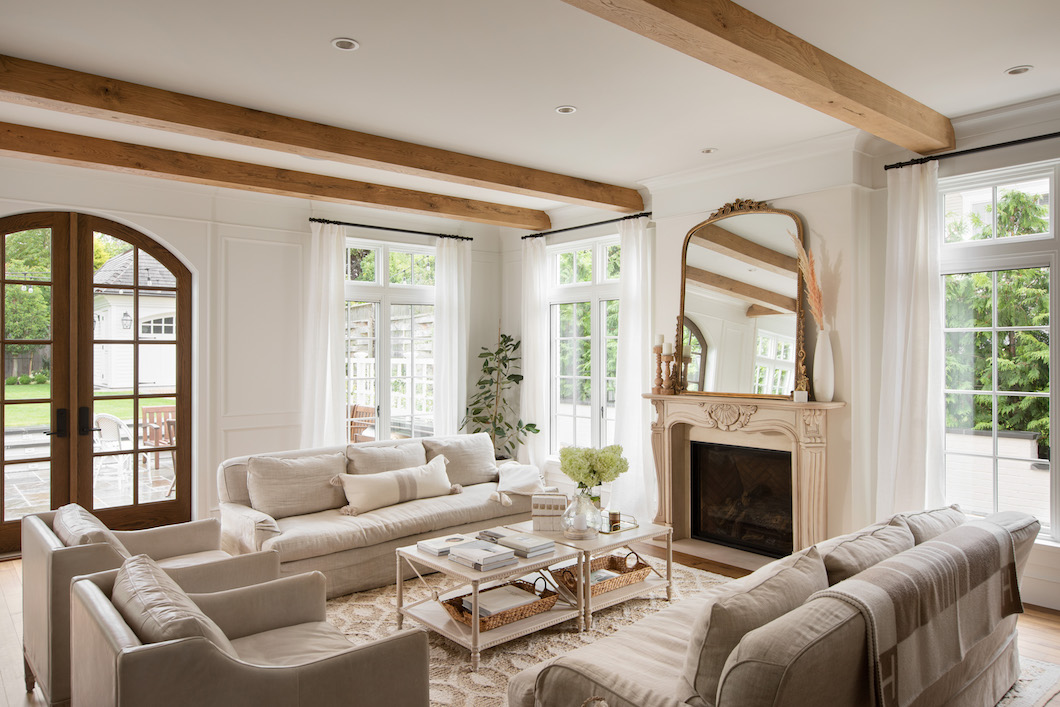 Benjamin Moore - Winter coziness is in full effect in this living room.  With plenty of plush accents, woodsy decor and homeowner fave White Dove  OC-17 on the walls and mantel, it